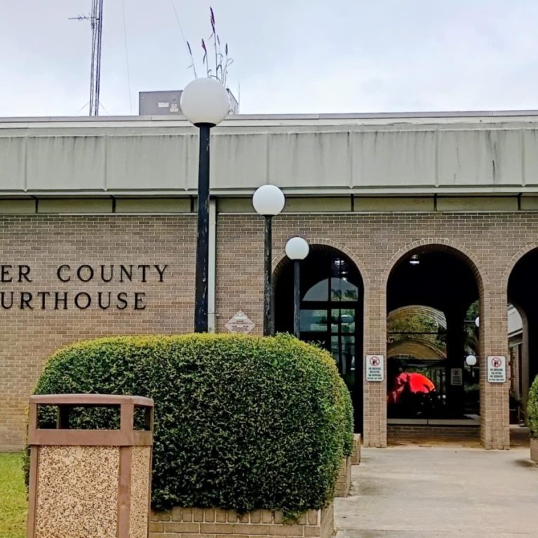 Sheriff TrT Trail 2025 - courthouse front with pumpkin rising in back